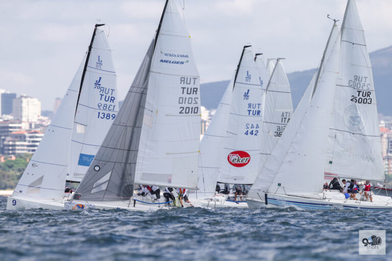J/70, Melges 24, and other sportsboats racing side-by-side on the start line
